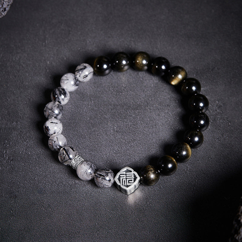 Flat view of Fu symbol gemstone bracelet
