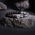 Fu symbol bracelet with golden sheen obsidian and black rutilated quartz