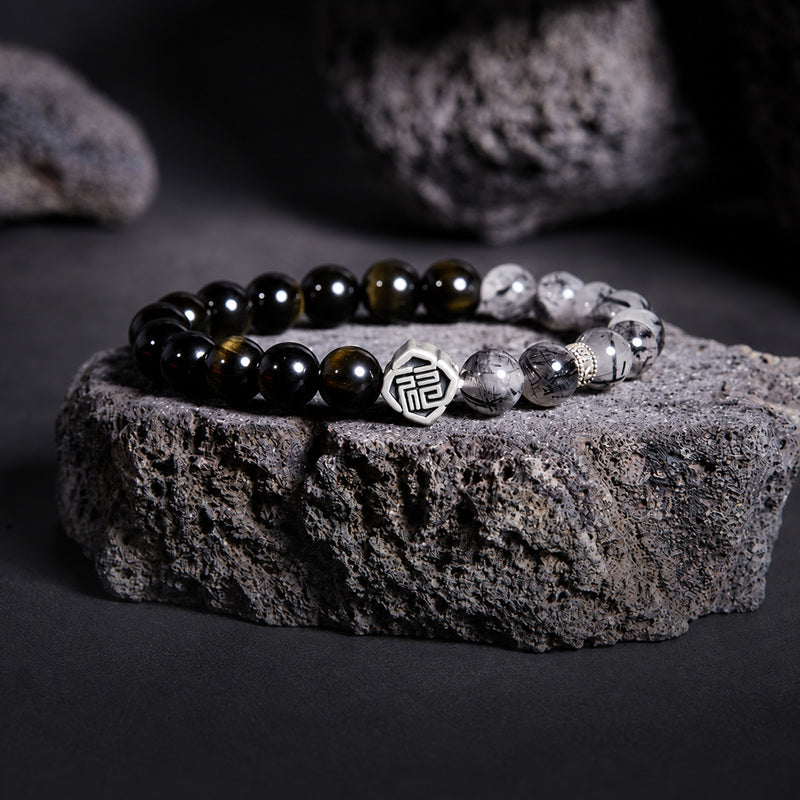 Fu symbol bracelet with golden sheen obsidian and black rutilated quartz