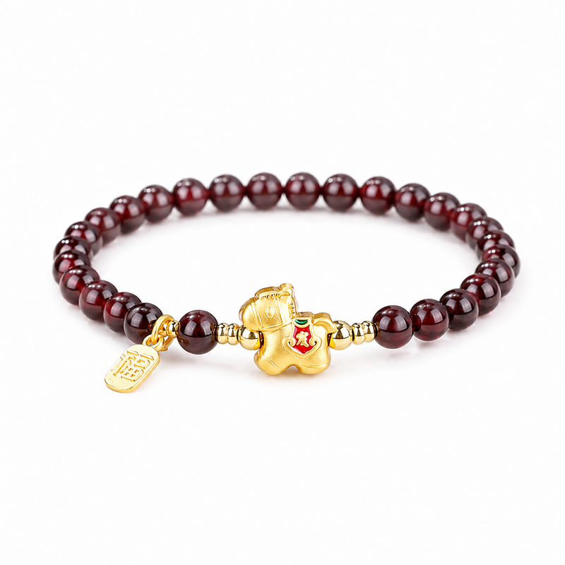 Garnet lucky horse bracelet on a clean white background