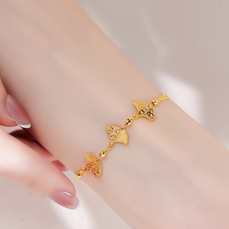 Ginkgo leaf bracelet shown on the supplier model's wrist