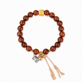 Gold Silk Sandalwood bracelet with silver horse top-down view