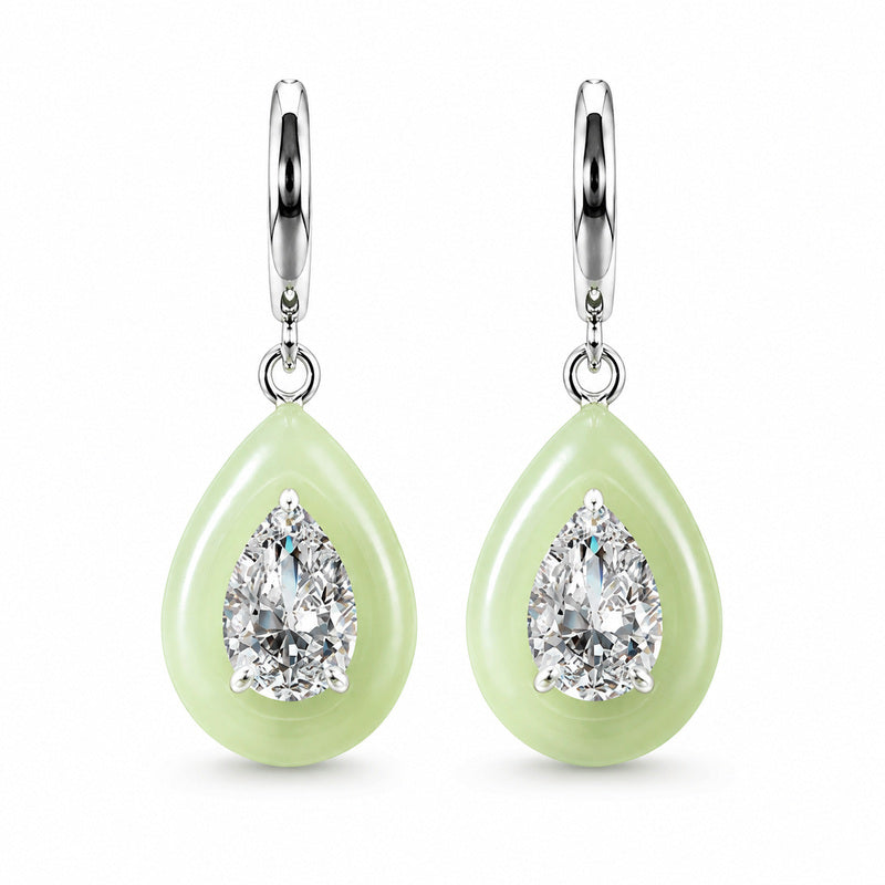 Greenish-white nephrite jade teardrop earrings on white background