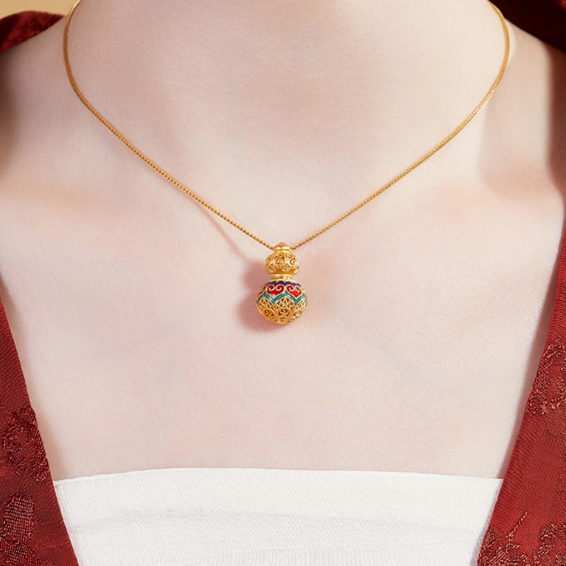 Supplier model wearing the heart gourd necklace with a red jacket