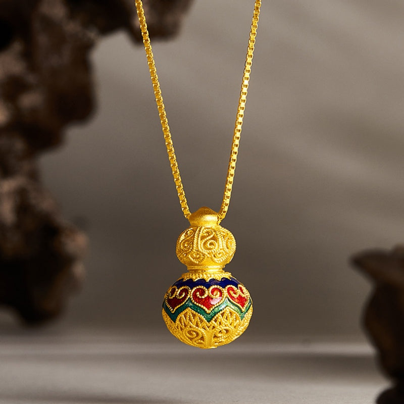 Heart gourd pendant suspended against a warm natural background