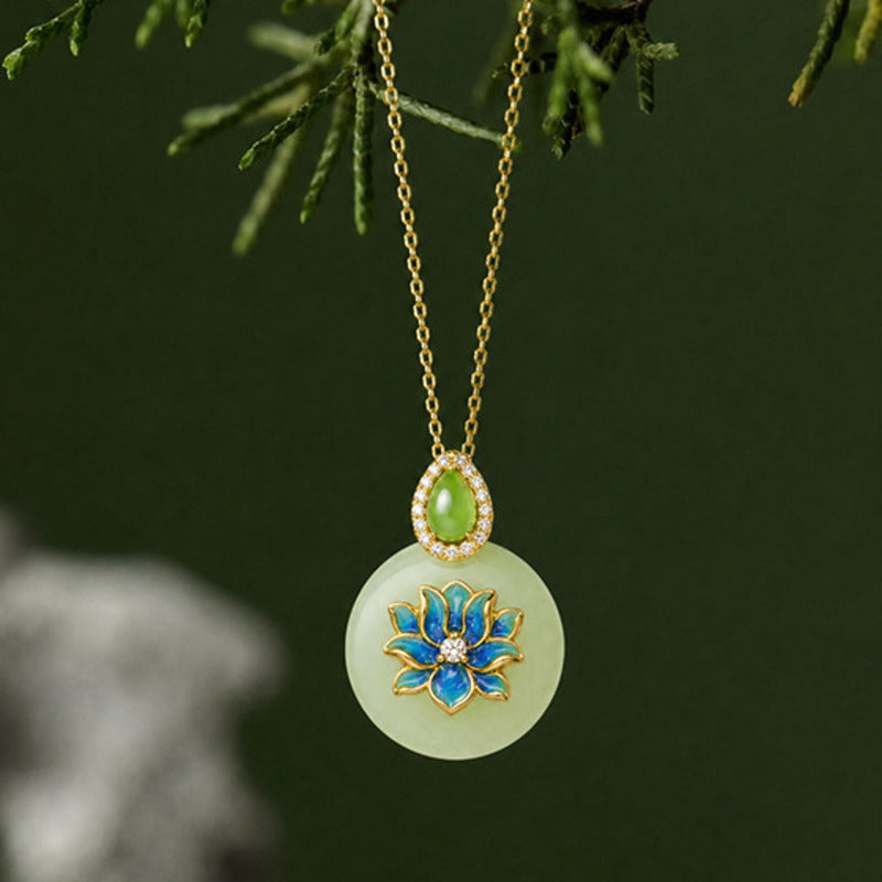 Hetian jade lotus peace buckle necklace on dark green background