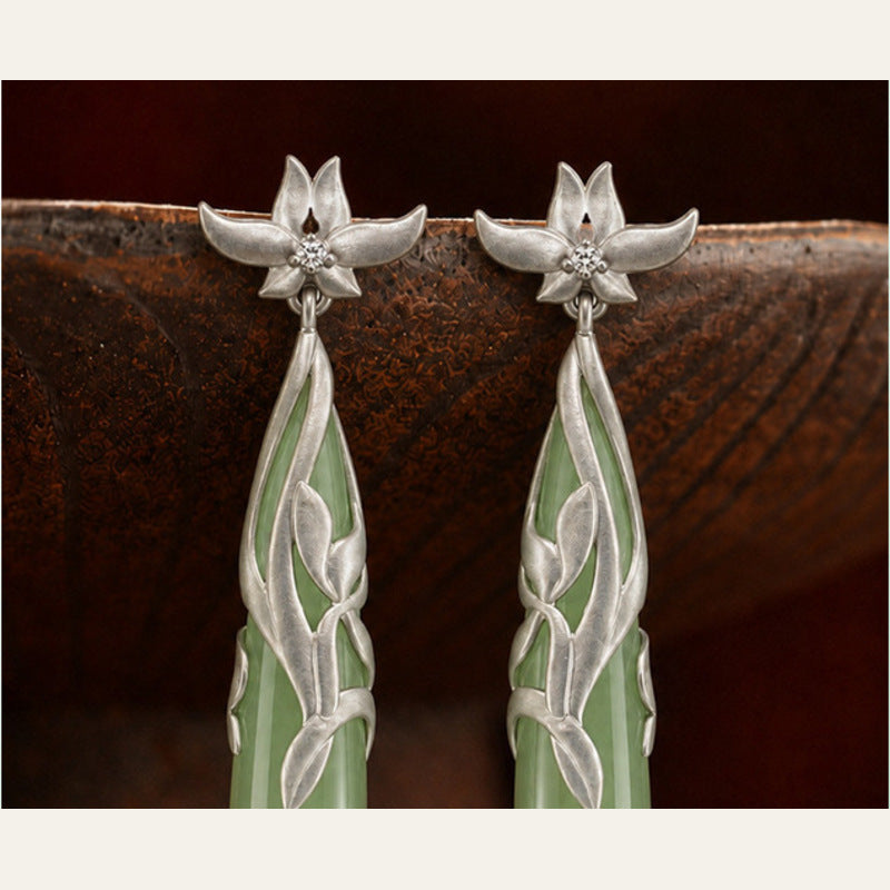 Magnolia silverwork and pale green Hetian jade detail
