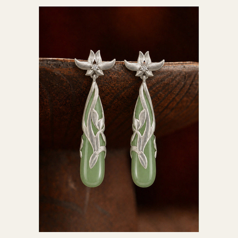 Front view of Hetian jade magnolia earrings pair