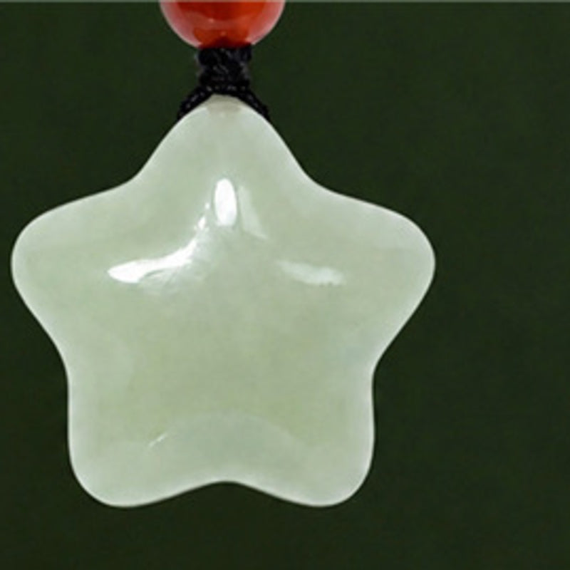 Close view of the polished natural Hetian jade star pendant