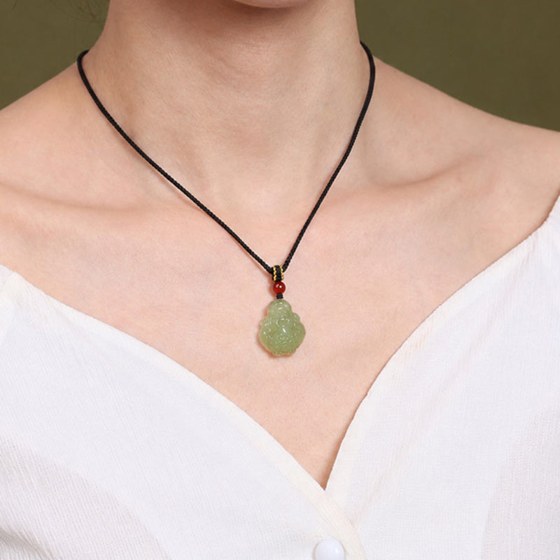 Model wearing the Hetian jade Wealth God pendant necklace