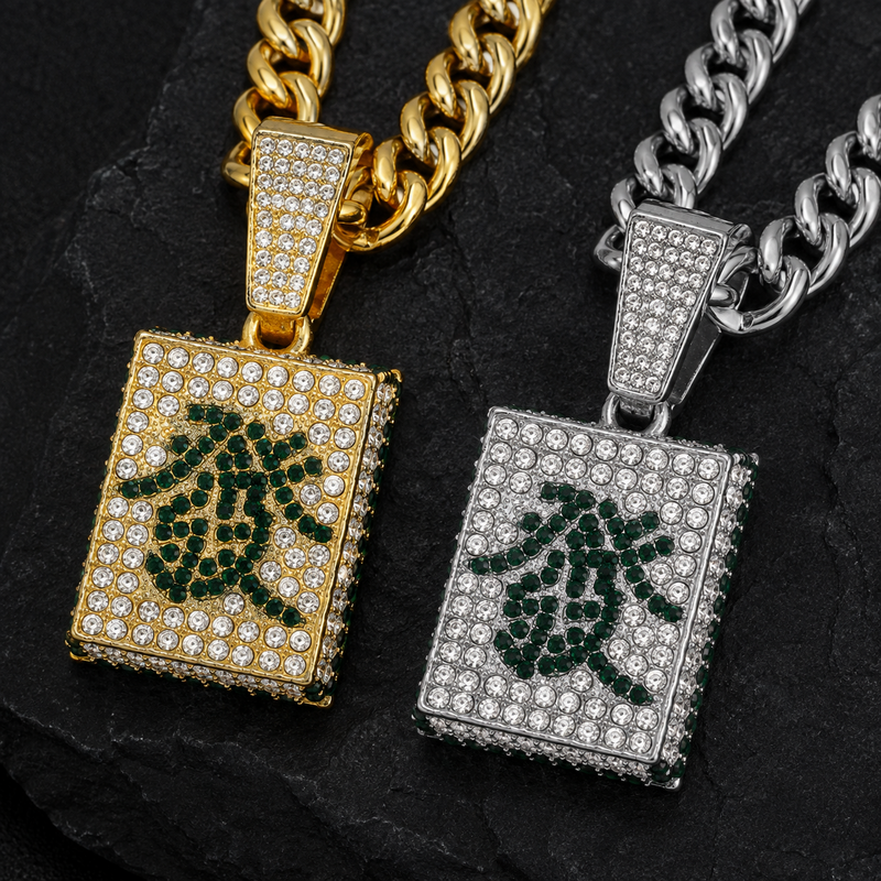 Gold and silver Mahjong wealth tile pendants on black