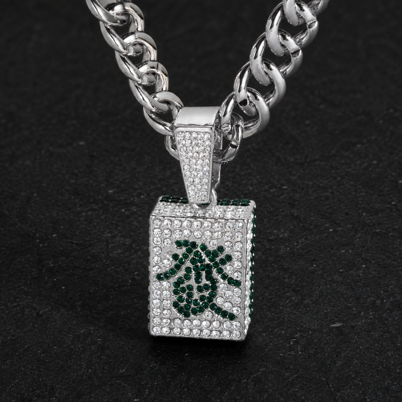 Silver pavé Mahjong wealth tile pendant on a dark background