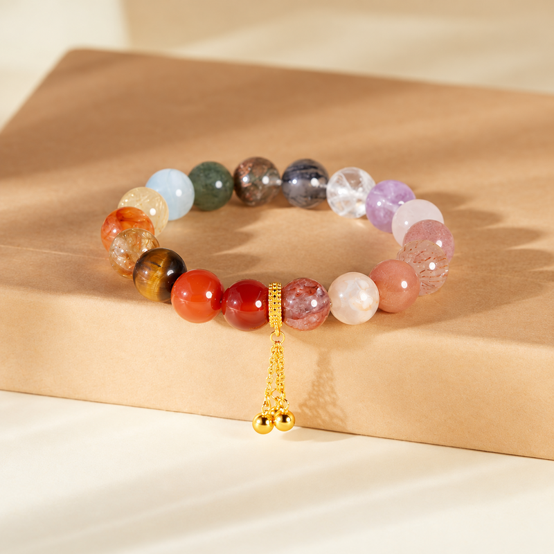 Multicolor eighteen-bead bracelet with tassel on a warm book background