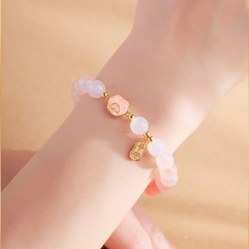 Cat paw crimson agate bracelet in warm natural wrist styling