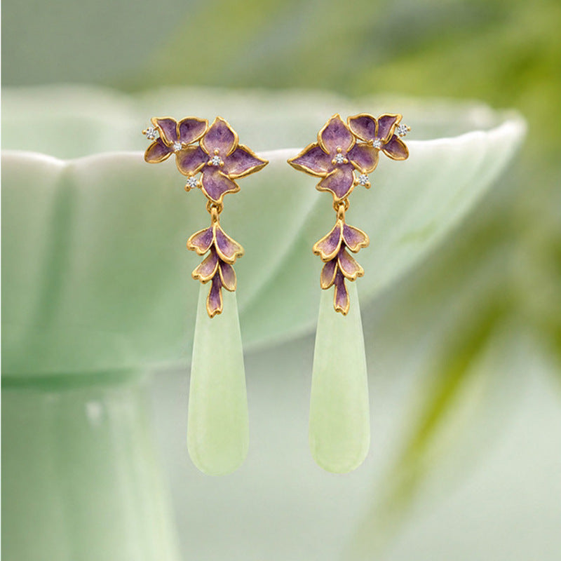 Natural jade iris earrings pair in a soft green setting