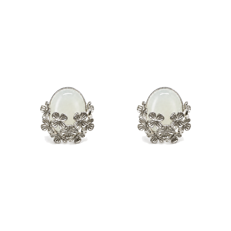 Nephrite jade flower stud earrings spaced evenly with compact shadows on white