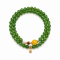 Nephrite jade gourd double-wrap bracelet on clean white background