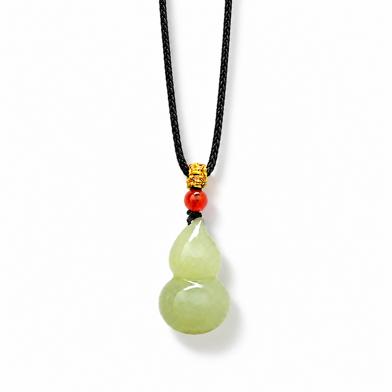 Nephrite jade gourd pendant with complete braided cord and soft shadow on white background