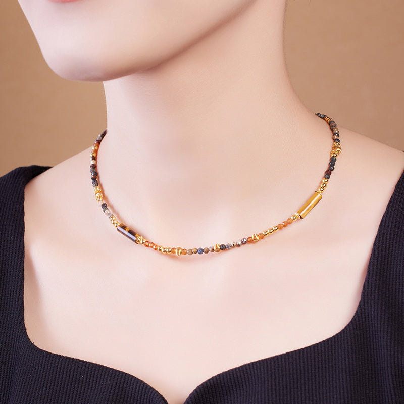 Model wearing the Pietersite and Orange Garnet short necklace