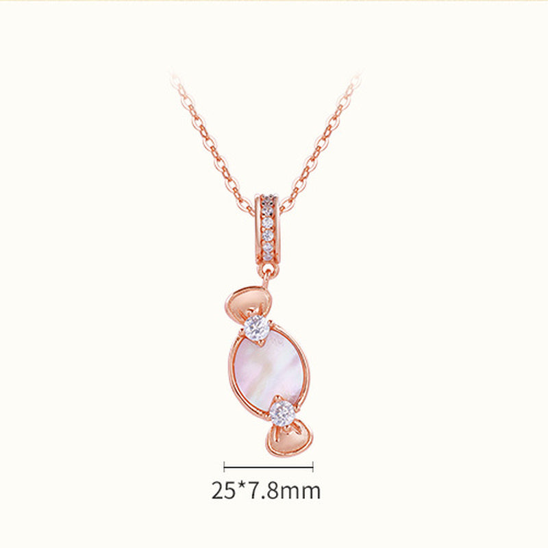 Front view of rose-gold color candy pendant necklace