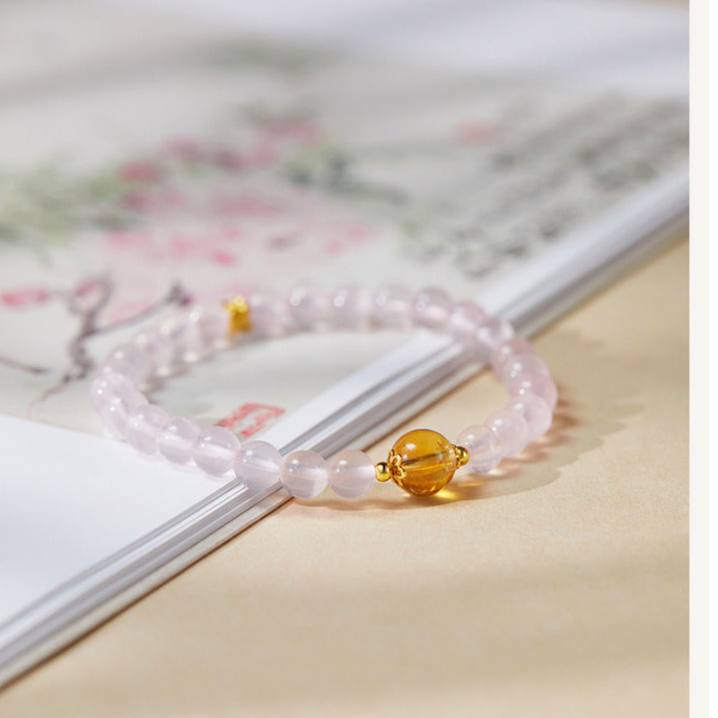 Pink crystal bracelet with citrine central bead