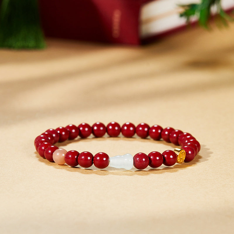 Purple Gold Sand gourd bracelet on a warm beige setting