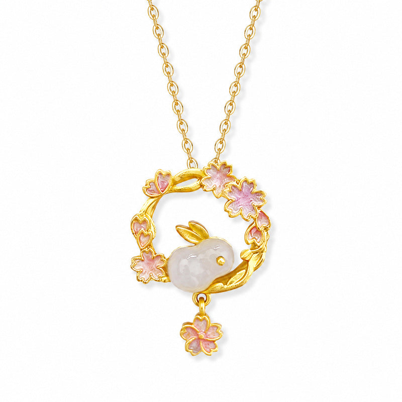 Nephrite jade rabbit floral necklace on clean white background