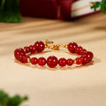 Red agate 925 silver bracelet on a warm sunlit background