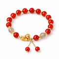 Red agate and moonstone lucky horse bracelet on white