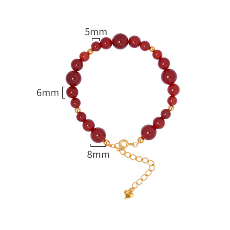 Red agate bracelet on white showing bead diameters and extender