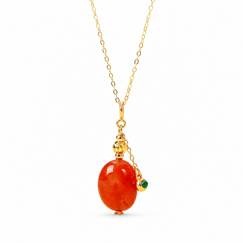 Red jade and green jadeite pendant necklace on white