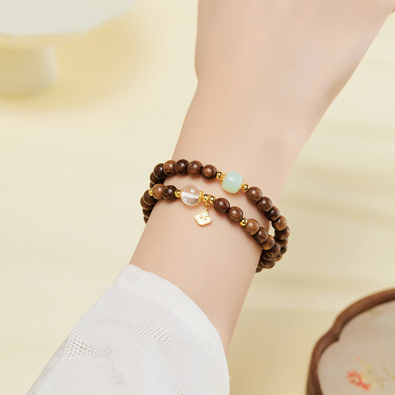 Supplier wrist photograph showing the double-wrap bracelet
