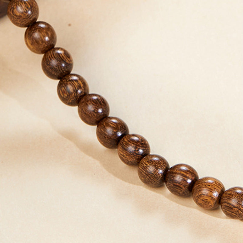 Golden Silk Sandalwood bead grain detail