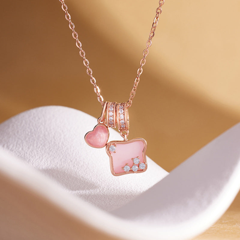 Pink shell toast heart pendant close detail