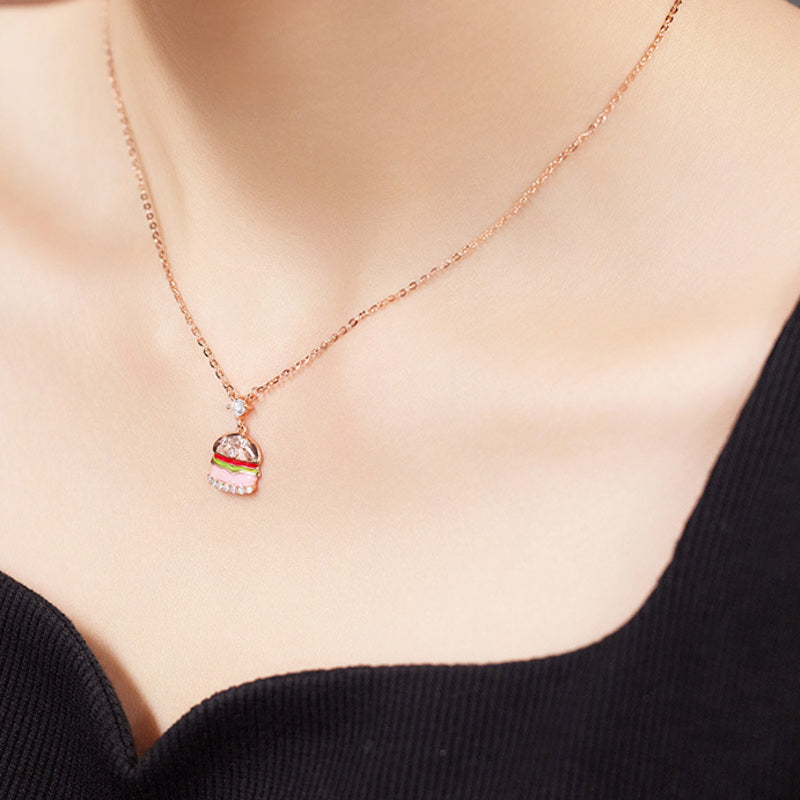 Model wearing S925 silver burger pendant necklace