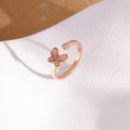 S925 silver textured butterfly adjustable open ring on warm paper