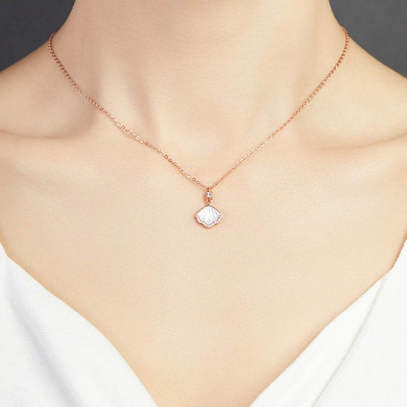 Original model wearing the shell necklace