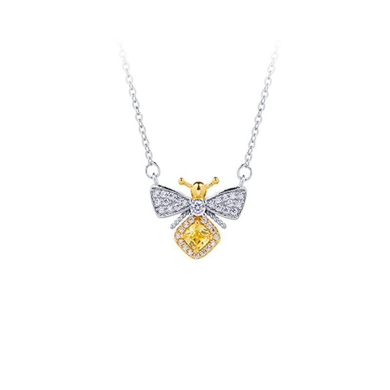 Original white background photograph of the silver bee necklace