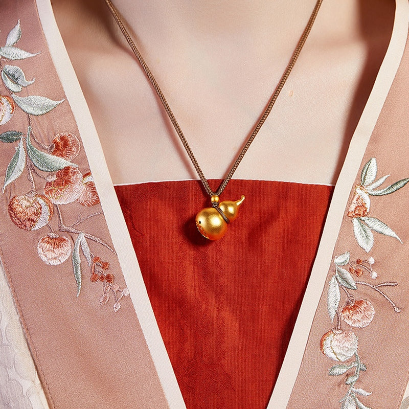 Original model wearing the fine silver gourd cord necklace