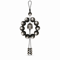 Silver obsidian Lion Dance car charm on white background