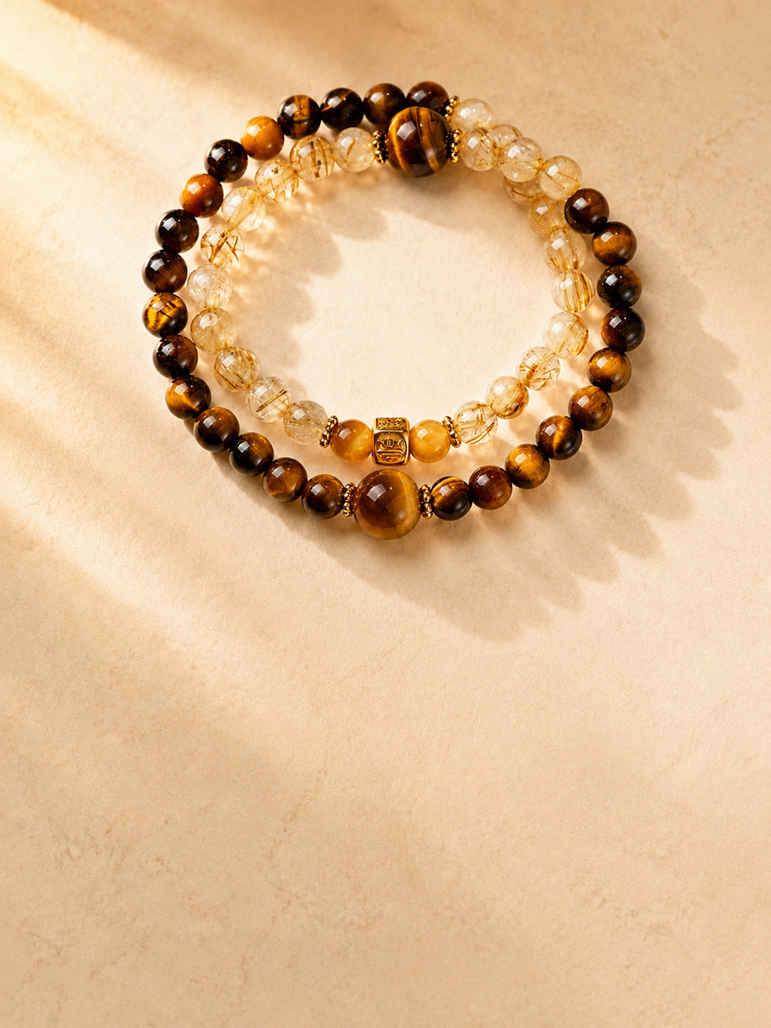 Tiger’s Eye and Golden Rutilated Quartz double-wrap bracelet mobile homepage hero with clear copy space