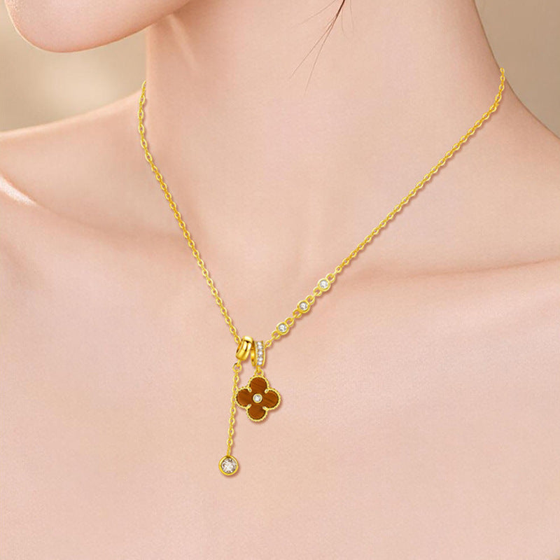 Model wearing Tiger's Eye four-leaf clover necklace