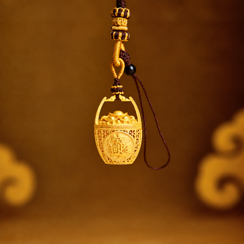 Gold-plated brass wealth basket charm with ingot details suspended against a warm golden background