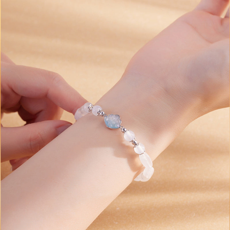 White chalcedony bead bracelet adjusted on wrist