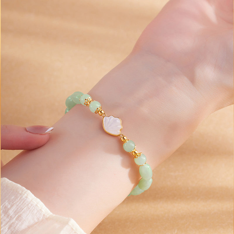 White shell fan bracelet close wrist view