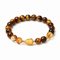 Tiger's Eye gourd bracelet on clean white studio background