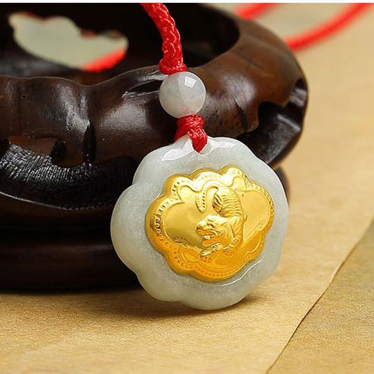 White jade Tiger zodiac pendant with 24K gold-plated animal medallion on red cord