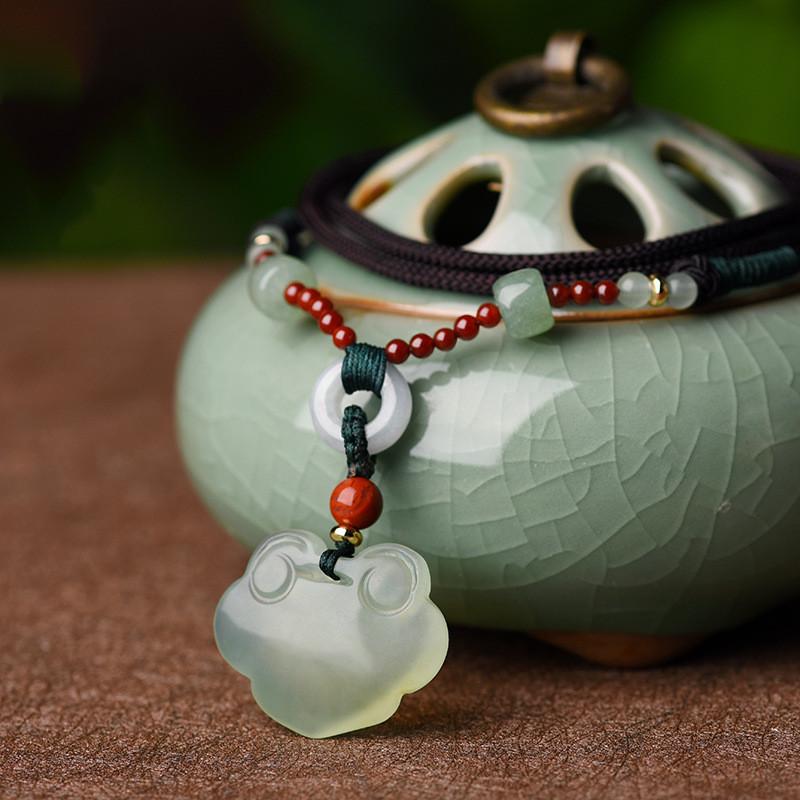 Auspicious Clouds Green Jade Wealth Pendant - FengshuiGallary