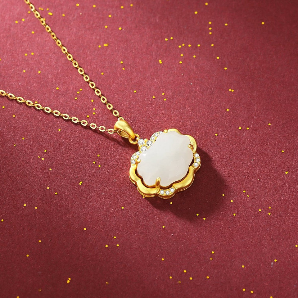 Auspicious Clouds White Jade Wealth Pendant - FengshuiGallary