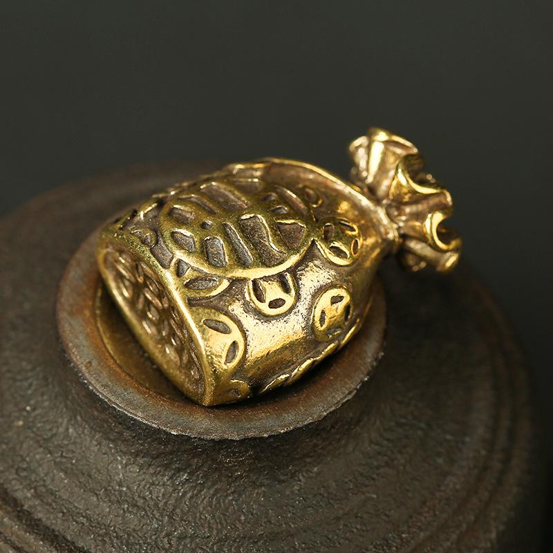 Auspicious Feng Shui Money Bag Brass Key Pendant - FengshuiGallary